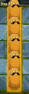 A column of costumed Tall-nuts on Gold Tiles in Epic Quest, Aloe, Salut!