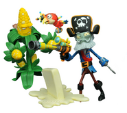 A Captain Deadbeard figure with Kernel Corn and Parrot Pal figures