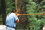 1024px-Blowgun demonstration in Oconaluftee Indian Village, Cherokee, North Carolina