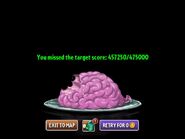 A brain in a Score Piñata Party game over screen (if the player completes a level without reaching the target score)