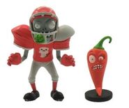 A Football Zombie figure with a Jalapeno figure