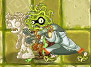 Zombie Medusa pushing a petrified zombie