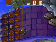 An early version of the Dr. Zomboss fight. The roof appears to have had its hue changed, the conveyor belt looks different and the level progress bar has a different font. Dated June 28, 2008.