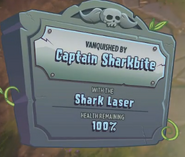 The player getting vanquished by Captain Sharkbite