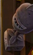 A Chomper statue in the background of Nightcap's missions