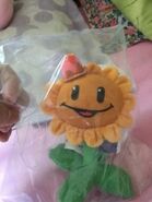 Keychain of the Birthdayz version of the Worldmax Toys Sunflower plush