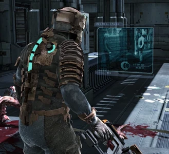 Isaac in the original Dead Space, looking at a computer screen.