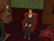 Kasandra na fotelu w salonie