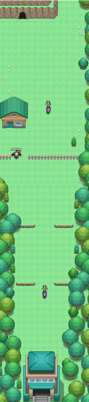 a grassy route leading to a green-roffed waystation