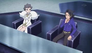 Diantha comments with the professor about Ash and Sawyer's battle.