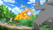 Braixen blocking Pangoro's attack