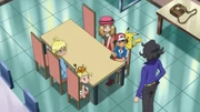 Professor Sycamore greeting the heroes.