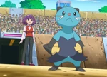 As an Oshawott, Dewott lost to Cilan's Pansage a while ago. It is the first Pokémon she sends out to battle Cilan, going up against Cilan's Dwebble. It has some powerful moves at its disposal, but they were unable to break through Dwebble's defenses and it was defeated. Dewott fought in the Clubsplosion where it was shown to have improved significantly.