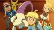 Clemont showing off his Aipom Arm.