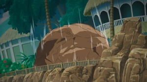 Ash's Lycanroc using Continental Crush.