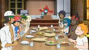 Everyone decides to eat at the end of the day, and Ash's next thing is going to be the Grand Trial with Olivia