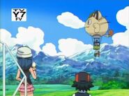 Dawn and Ash see Team Rocket's balloon