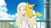 Lillie with Ash's Pikachu on her shoulder