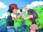 Dawn and Ash give a high-five