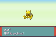 A screenshot of Abra starting to evolve into Kadabra in Pokémon Emerald Version