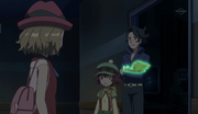 Professor Sycamore carrying a comatose Chespie.