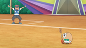 Ash demonstrates to Rowlet to flap its wings