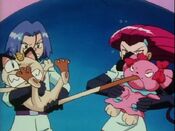 Jessie and James try to separate Snubbull and Meowth