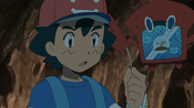 Ash finds a Diglett hair, which can be used by Rockruff to sense where there's Diglett in the cave to avoid them