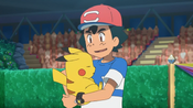 Ash holds Pikachu, who collapsed from exhaustion