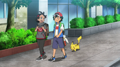 Ash and Goh walking to a movie set