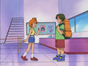 Misty tells Tracey of the new Pokémon that came to the Gym