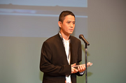 Satoshi Tajiri receiving a award