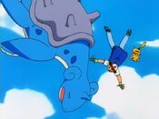 Lapras, Pikachu and Ash fall down