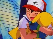 Ash hugs Pikachu