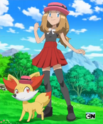 As Fennekin with her trainer, wearing a matching hat