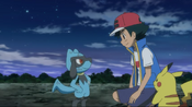 Riolu accepts Ash as a worthy trainer.