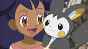 Emolga sitting on Iris' shoulder