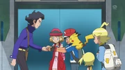 Sycamore giving out two new Pokédexes for Ash and Serena.
