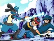 Lucario attacks Ash and Riley