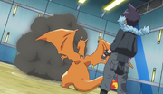 Alain and Charizard training for the finals.