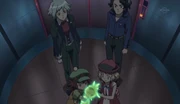 Sycamore, Steven Stone, Mairin, Serena and a comatose Chespie in a lift.