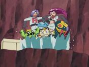 A jet of water blasts Team Rocket away