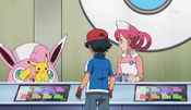 Ash receiving his Pokémon back from Nurse Joy