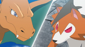 Charizard and Lycanroc are battling one another