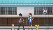 Ash and Goh arriving in Ecruteak City