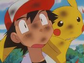 Ash and Pikachu get burned by Charizard