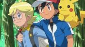 Clemont helping Ash stand straight