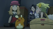 Sycamore, Serena and Bonnie trapped inside Team Rocket's van.