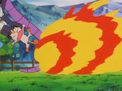 Arcanine blasts off Team Rocket using Flame Wheel