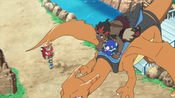 Kiawe flies on Charizard with Popplio